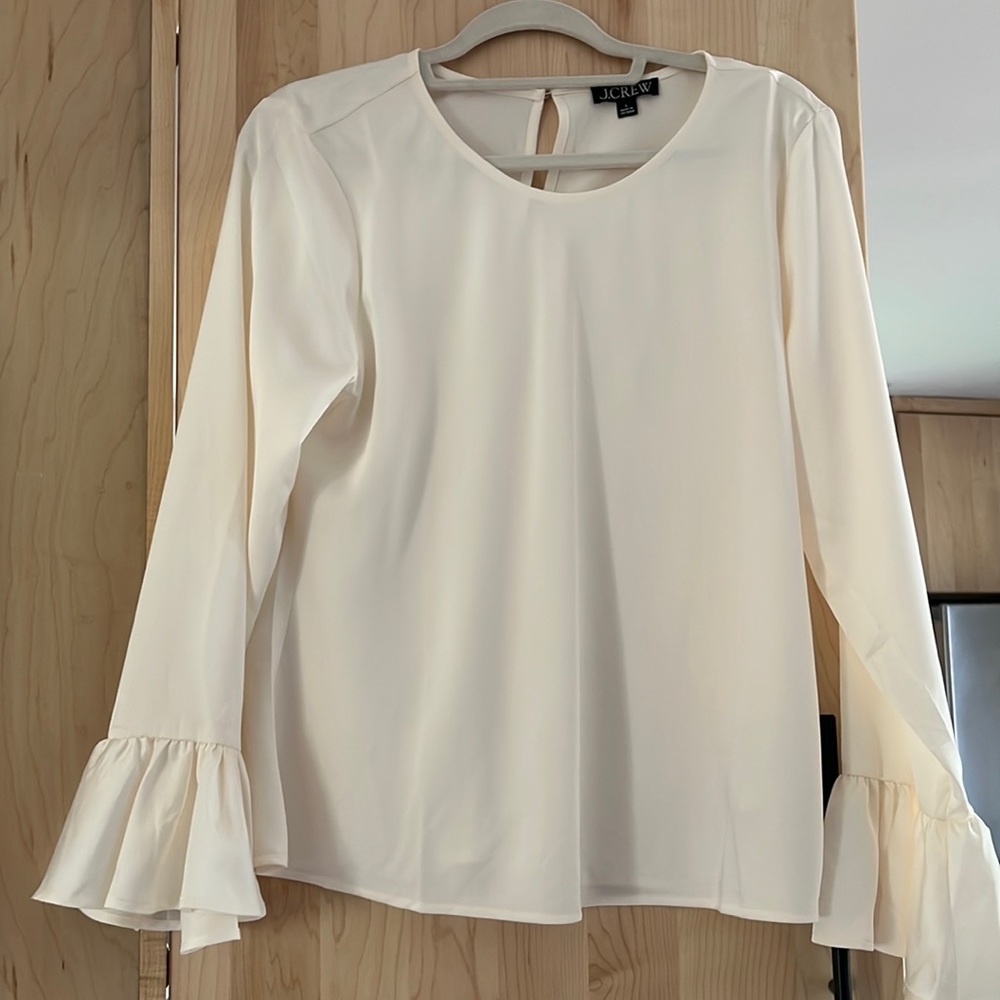 Very cute cream colored blouse from J. Crew. Never worn- NWOT